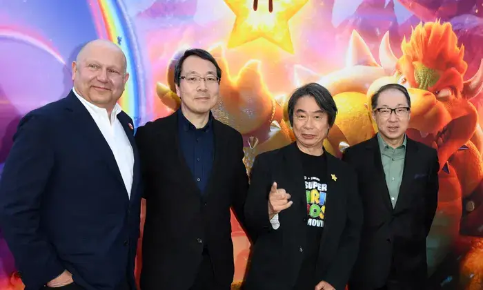 Super Mario Bros. or Ground Theme Nintendo music composer Koji Kondon, right, with other team members at Universal’s The Super Mario Bros Movie special screening (Photo credit: Valérie Macon/AFP/Getty Images)